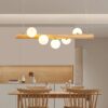 PATRIK Wood Rod With Glass Ball Pendant Lamp - dining table pendant